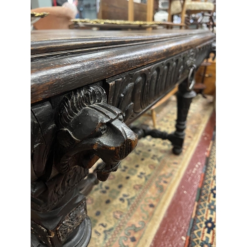 451 - Antique carved oak center table with integrated drawer - Approx W: 115cm D: 72cm H: 76cm