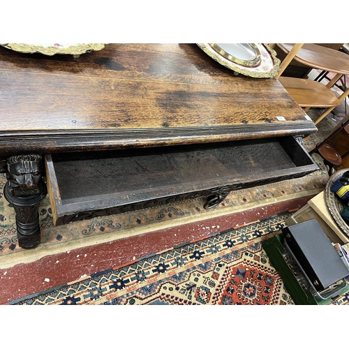 451 - Antique carved oak center table with integrated drawer - Approx W: 115cm D: 72cm H: 76cm