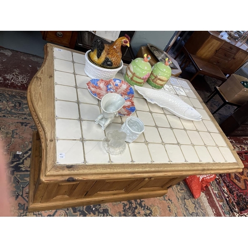 476 - Tile topped pine kitchen island with cupboards and wine rack to base