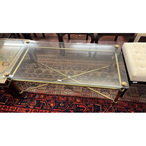 528 - Glass topped brass framed coffee table