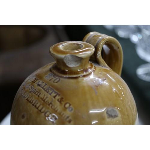 244 - Collection of stoneware flaggons, glass bottles & breweriana