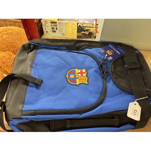 173 - Barcelona FC backpack together with a pair of Nike football boots size 8