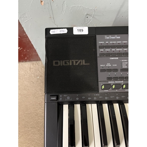 189 - Technics SX-K700 PMC electronic keyboard together with stand, foot pedal, carry case and book