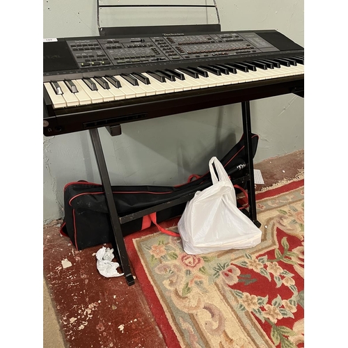 189 - Technics SX-K700 PMC electronic keyboard together with stand, foot pedal, carry case and book