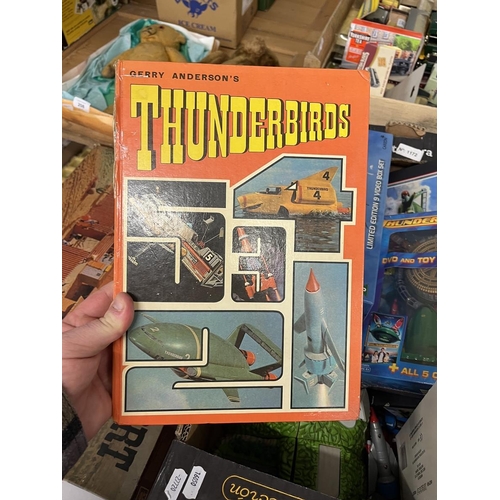 210 - Good collection of Thunderbirds vehicles, Tracy Island, annual, etc