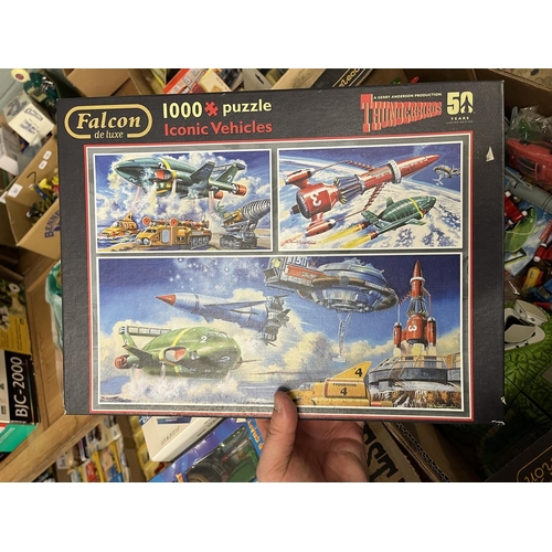 210 - Good collection of Thunderbirds vehicles, Tracy Island, annual, etc