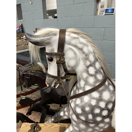 218 - Fine quality rocking horse with leather saddle and real horse hair in excellent condition