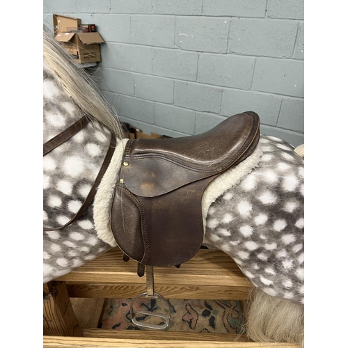 218 - Fine quality rocking horse with leather saddle and real horse hair in excellent condition