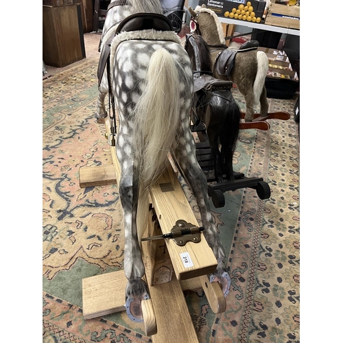 218 - Fine quality rocking horse with leather saddle and real horse hair in excellent condition