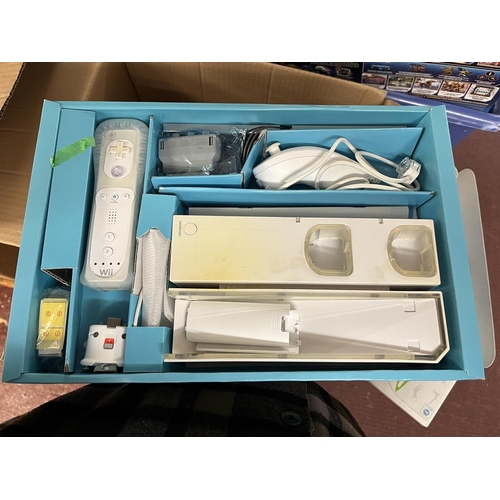 224 - Nintendo Wii games console including Wii fit games accessories