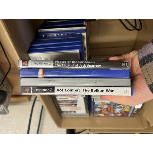 227 - Sony Play Station 2 with huge games collection and accessories to include Superbike Racer controller