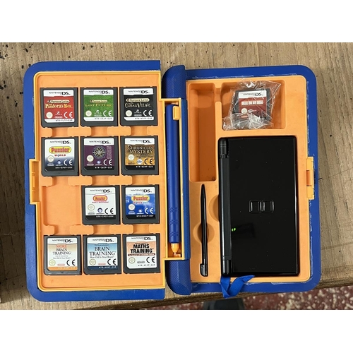 232 - Nintendo DS Lite with games, cables and case