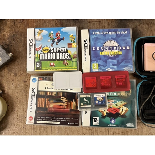 234 - Nintendo DS Lite with selection of games