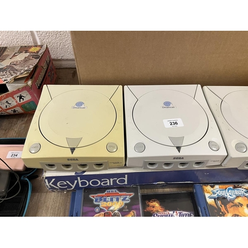 236 - 3 Sega Dreamcast consoles together with accessories and games