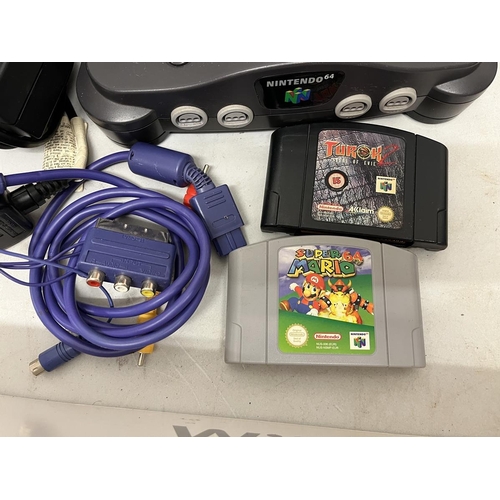 240 - Nintendo 64 in original box with games