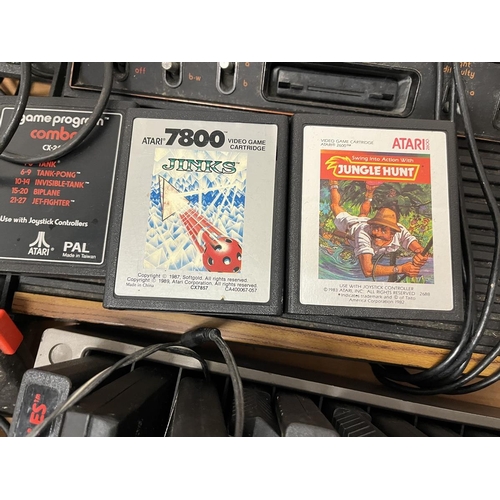 241 - 2 Atari 2600 games consoles with games and accessories