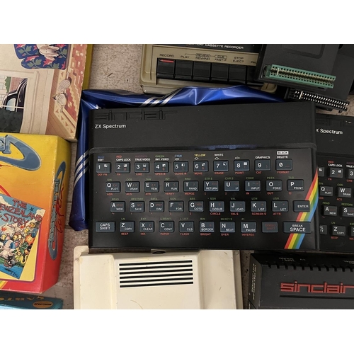 243 - Huge collection of Sinclair Spectrum computers with games and accessories