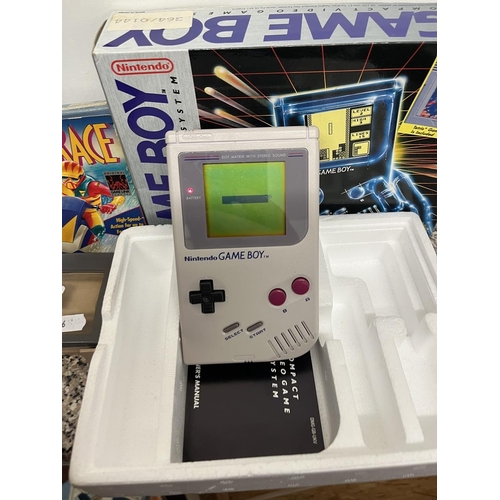 244 - Nintendo Game Boy in original box with games