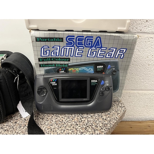 246 - Sega Game Gear in original box and 4 boxed games in carry case