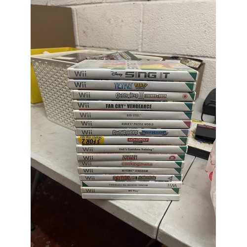 247 - Nintendo Wii in original box with good selection of games