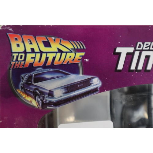 414 - 2 boxed die cast Delorean cars from Back to the Future and Back to the Future II