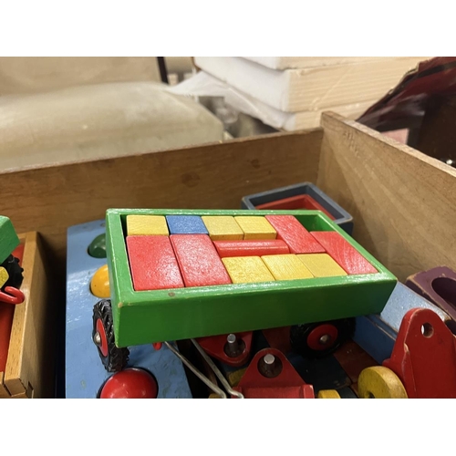 428 - Collection of coloured wooden building blocks etc