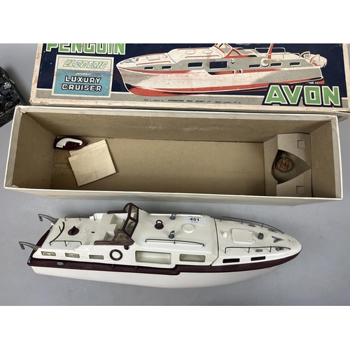 451 - Penguin super scale model Avon 17 inch battery powered boat in original box together with a pond yac... 