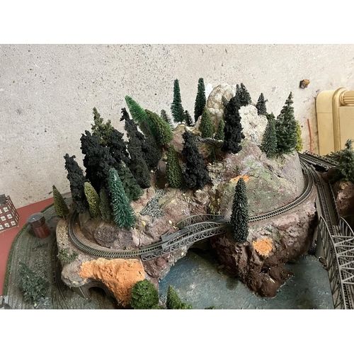 455 - Marklin Z-gauge model railway set diorama. Wired with track but no rolling stock. Complete with tran... 