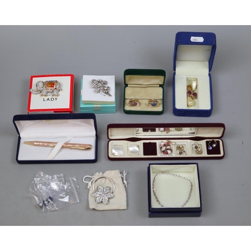 131 - Collection of costume jewellery to include silver and a pen