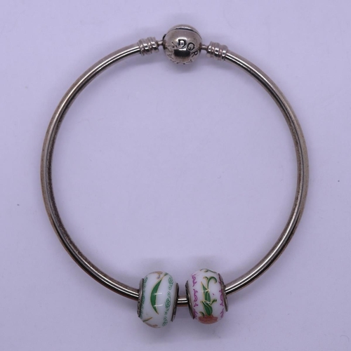 138 - Pandora silver bracelet with 2 charms