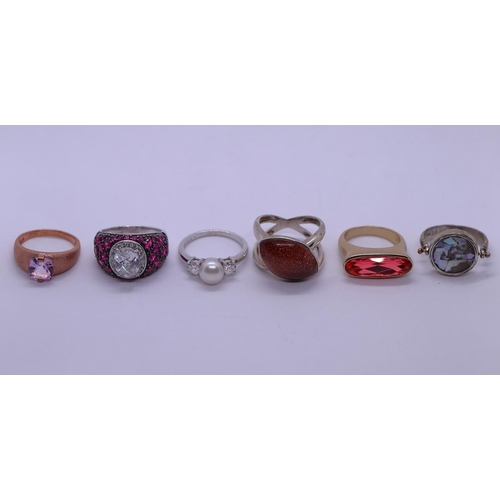 140 - Collection of 6 silver stone set rings