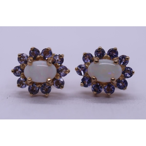 146 - Pair of gold opal and tanzanite earrings