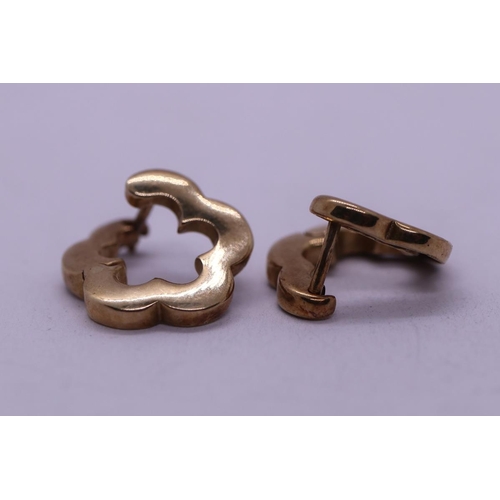 148 - Pair of gold earrings