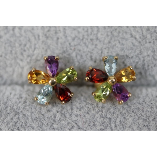 154 - Pair of gold multi-stone set earrings