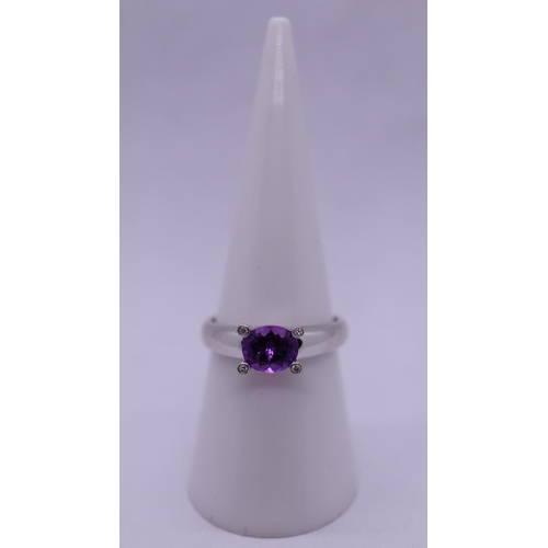 155 - Fine 18ct white gold diamond and amethyst ring - Size N