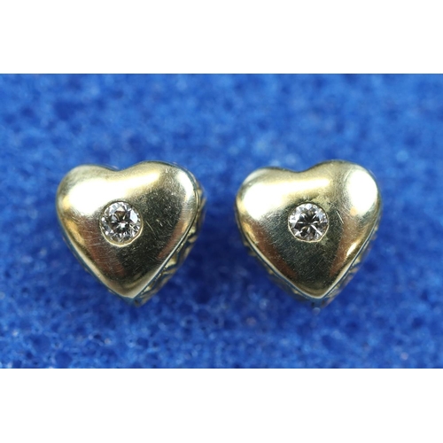 164 - Pair of gold heart shaped diamond earrings