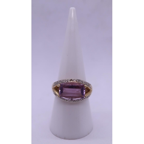 165 - Gold faceted amethyst and diamond ring - Size O