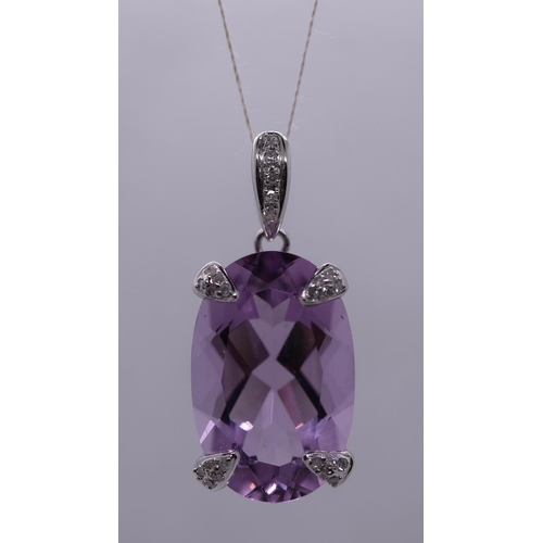 172 - 9ct white gold amethyst set pendant