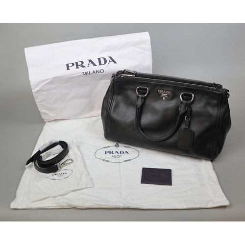 257 - Genuine Prada handbag with original dust bag and C.O.A