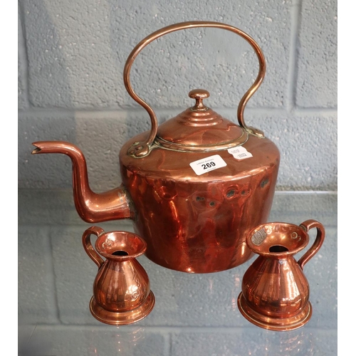 269 - Copper kettle together with 2 copper measures