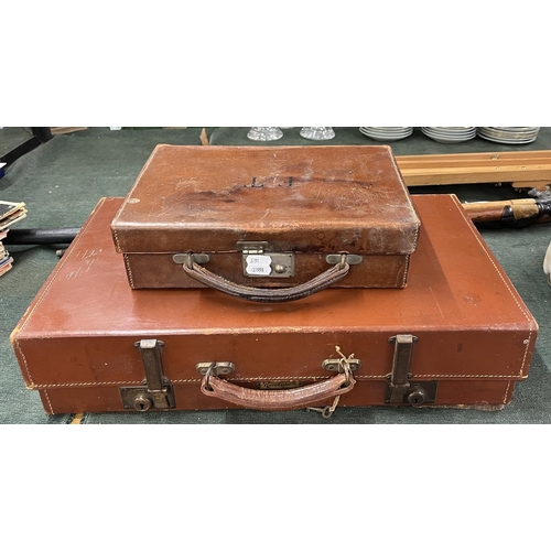 399 - 2 leather suitcases in good condition