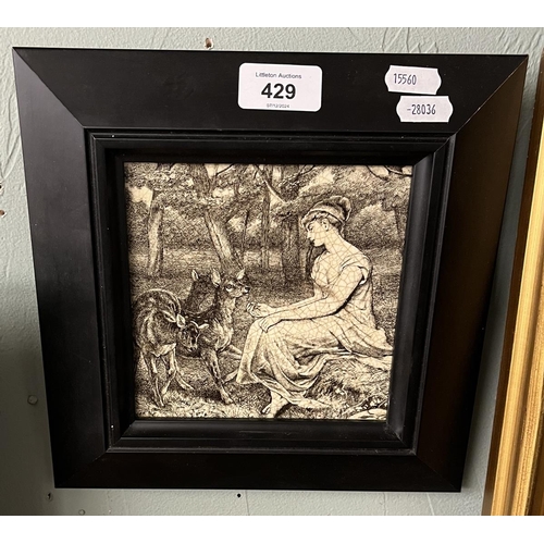 429 - Framed tile depicting a lady with deer