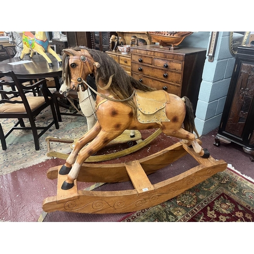 526 - Carved wooden rocking horse