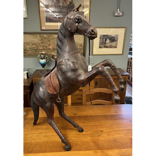 577 - Liberty’s style large rearing leather horse - Approx height: 96cm