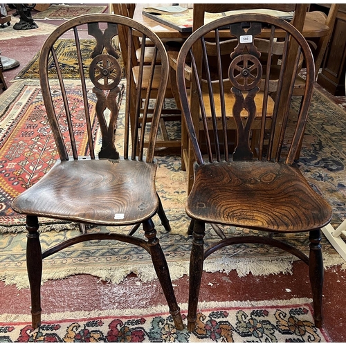 580 - Pair of antique wheel-back chairs with crinoline stretchers