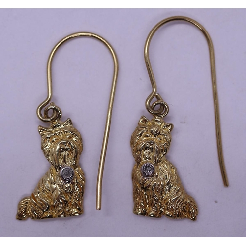 67 - Pair of silver gilt diamond set dog earrings