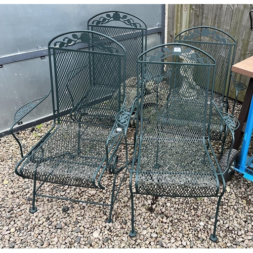 712 - 4 metal garden chairs with cushions