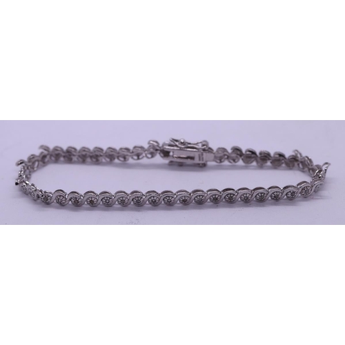 73 - Silver diamond set tennis bracelet