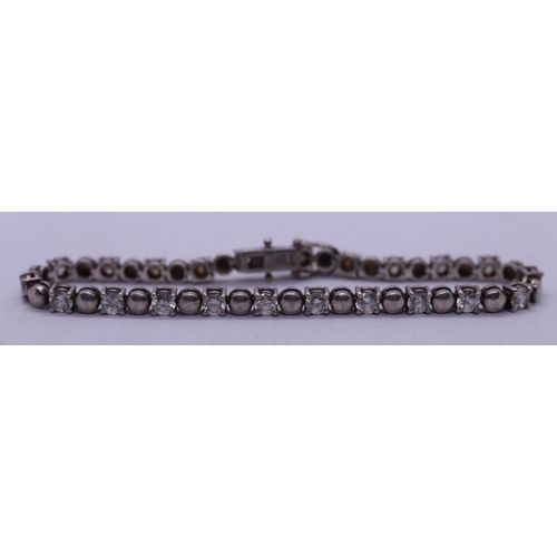 100 - Silver stone set tennis bracelet