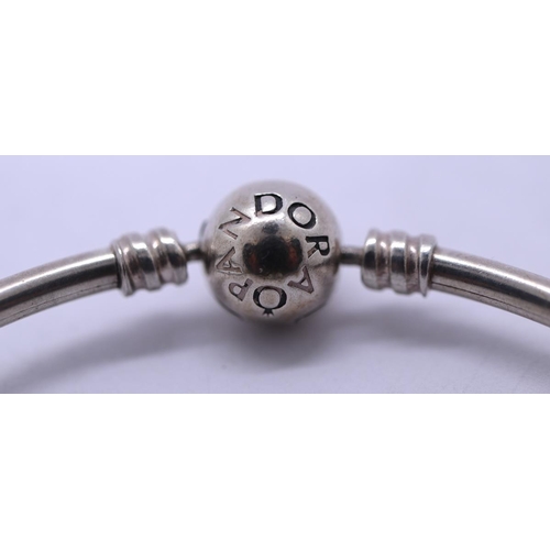 138 - Pandora silver bracelet with 2 charms